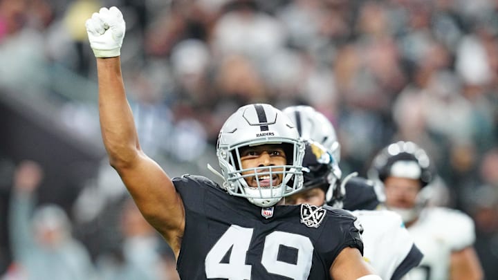 Dec 22, 2024; Paradise, Nevada, USA; Las Vegas Raiders defensive end Charles Snowden (49) celebrates after a play against the Jacksonville Jaguars during the second quarter at Allegiant Stadium. Mandatory Credit: Stephen R. Sylvanie-Imagn Images