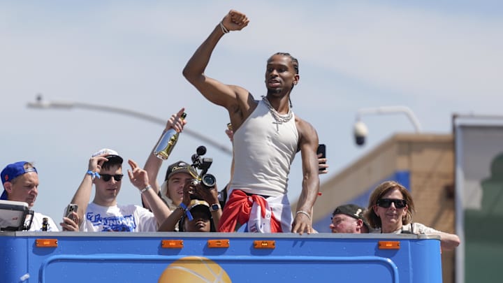Oklahoma City Thunder guard Shai Gilgeous-Alexander gestures to the crowd as the  Oklahoma City Thunder celebrate their first NBA Finals title win with a champions parade throughout downtown Oklahoma City on Tuesday, June 24, 2025.  Mandatory Credit: Bryan Terry/USA TODAY NETWORK via Imagn Images