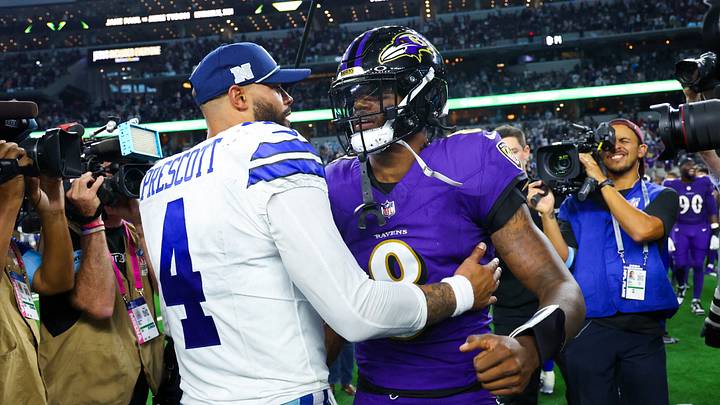 Dallas Cowboys quarterback Dak Prescott hugs Baltimore Ravens quarterback Lamar Jackson at AT&T Stadium. Dallas Cowboys quarterback Dak Prescott hugs Baltimore Ravens quarterback Lamar Jackson at AT&T Stadium.