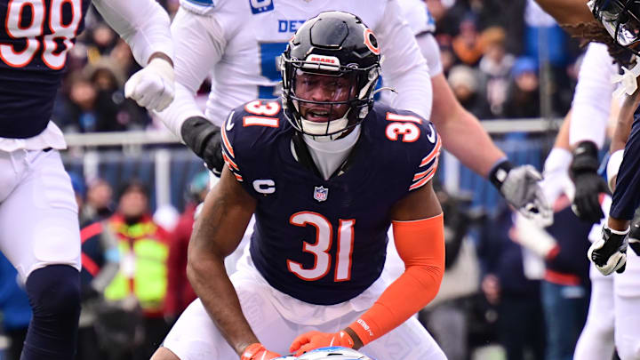 Dec 22, 2024; Chicago, Illinois, USA; Chicago Bears free safety Kevin Byard (31) celebrates his defensive stop of Detroit Lions running back Jahmyr Gibbs (26) during the first quarter at Soldier Field. Mandatory Credit: Daniel Bartel-Imagn Images Dec 22, 2024; Chicago, Illinois, USA; Chicago Bears free safety Kevin Byard (31) celebrates his defensive stop of Detroit Lions running back Jahmyr Gibbs (26) during the first quarter at Soldier Field. Mandatory Credit: Daniel Bartel-Imagn Images