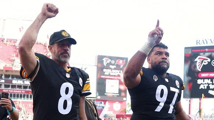 Pittsburgh Steelers quarterback Aaron Rodgers and Pittsburgh Steelers defensive tackle Cameron Heyward Pittsburgh Steelers quarterback Aaron Rodgers and Pittsburgh Steelers defensive tackle Cameron Heyward