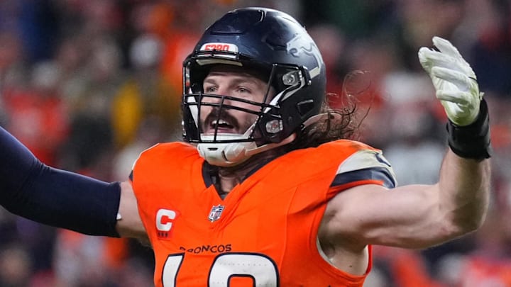 Dec 14, 2025; Denver, Colorado, USA; Denver Broncos linebacker Alex Singleton (49) celebrates defeating the Green Bay Packers during the fourth quarter at Empower Field at Mile High. Mandatory Credit: Ron Chenoy-Imagn Images