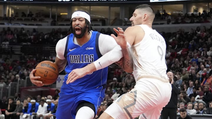 Mar 29, 2025; Chicago, Illinois, USA; Chicago Bulls center Nikola Vucevic (9) defends Dallas Mavericks forward Anthony Davis (3) during the second half at United Center. Mandatory Credit: David Banks-Imagn Images Mar 29, 2025; Chicago, Illinois, USA; Chicago Bulls center Nikola Vucevic (9) defends Dallas Mavericks forward Anthony Davis (3) during the second half at United Center. Mandatory Credit: David Banks-Imagn Images