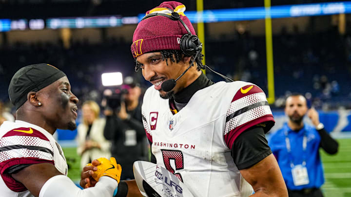 Washington Commanders quarterback Jayden Daniels is named Tom Brady’s LFG Player of the Game after defeating the Detroit Lions 45-31 in the NFL divisional round at Ford Field in Detroit, Saturday, Jan. 18, 2025. He is congratulated by rookie cornerback Mike Sainristil, who had two interceptions. Washington Commanders quarterback Jayden Daniels is named Tom Brady’s LFG Player of the Game after defeating the Detroit Lions 45-31 in the NFL divisional round at Ford Field in Detroit, Saturday, Jan. 18, 2025. He is congratulated by rookie cornerback Mike Sainristil, who had two interceptions.