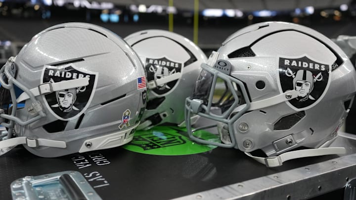 Nov 23, 2025; Paradise, Nevada, USA; Las Vegas Raiders helmets on the sidelines at Allegiant Stadium. Mandatory Credit: Kirby Lee-Imagn Images