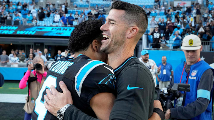 Nov 3, 2024; Charlotte, North Carolina, USA; Carolina Panthers quarterback Bryce Young (9) with head coach Dave Canales after the game at Bank of America Stadium. Mandatory Credit: Bob Donnan-Imagn Images