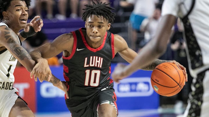 Nigel James of Long Island Lutheran showed off his incredible athletic ability, Monday, with a spectacular block during his team's game against Le Lumiere (Indiana) at the Hoophall Classic in Springfield, Massachusetts.