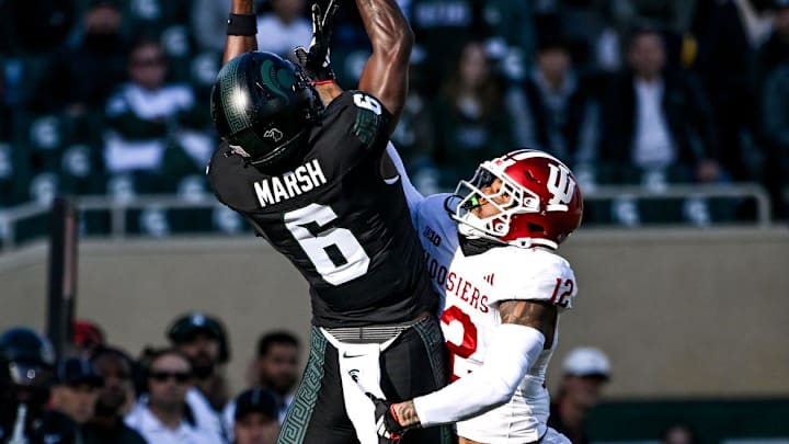 Michigan State's Nick Marsh, left, makes a catch as Indiana's Terry Jones Jr. defends during the first quarter on Saturday, Nov. 2, 2024, at Spartan Stadium in East Lansing. Michigan State's Nick Marsh, left, makes a catch as Indiana's Terry Jones Jr. defends during the first quarter on Saturday, Nov. 2, 2024, at Spartan Stadium in East Lansing.
