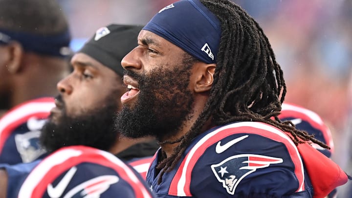 August 8, 2024; Foxborough, MA, USA;  Former New England Patriots linebacker Matthew Judon (9) on the sideline during the first half against the Carolina Panthers at Gillette Stadium.