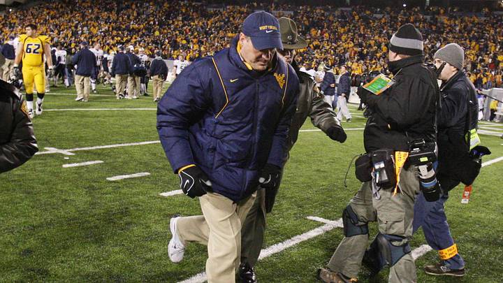 Dec 1, 2007, Morgantown, WV, USA; West Virginia Mountaineer head coach Rich Rodriguez leaves the field after the Mountaineers 13-9 loss to the Pittsburgh Panthers at Mylan Puskar Stadium. Duhart recovered the fumble. Mandatory Credit: Bob Donnan-Imagn Images