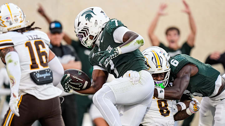 Michigan State running back Brandon Tullis (7) runs for a touchdown against Western Michigan during the first half at Spartan Stadium in East Lansing on Friday, August 29, 2025. Michigan State running back Brandon Tullis (7) runs for a touchdown against Western Michigan during the first half at Spartan Stadium in East Lansing on Friday, August 29, 2025.