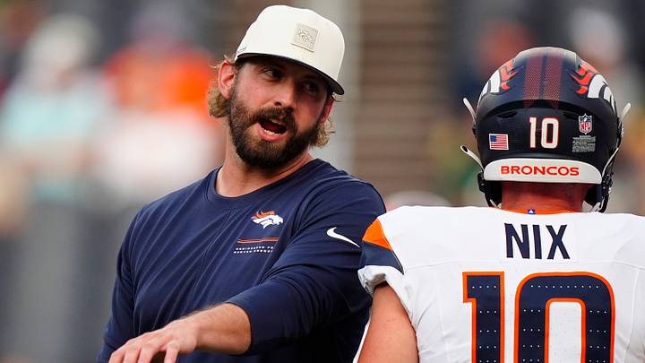 Aug 21, 2026; Denver, Colorado, USA; Denver Broncos offensive coordinator Davis Webb before the preseason game against the Green Bay Packers at Empower Field at Mile High. Aug 21, 2026; Denver, Colorado, USA; Denver Broncos offensive coordinator Davis Webb before the preseason game against the Green Bay Packers at Empower Field at Mile High.