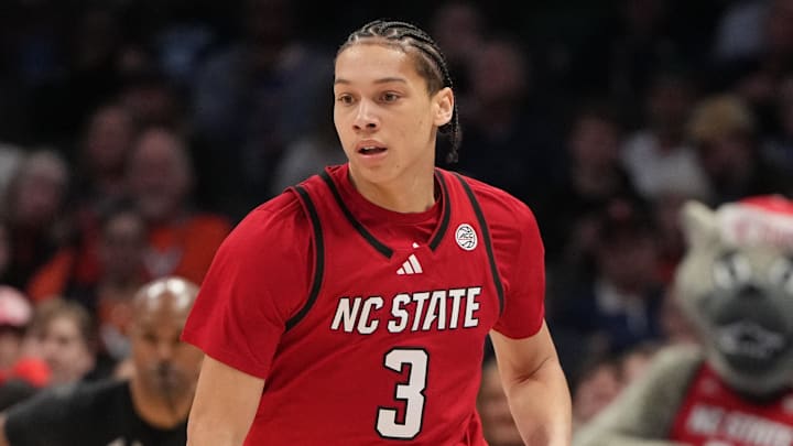 Mar 12, 2026; Charlotte, NC, USA; NC State Wolfpack guard Matt Able (3) brings the ball up the court in the first half at Spectrum Center. Mandatory Credit: Bob Donnan-Imagn Images