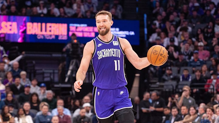 Feb 24, 2025; Sacramento, California, USA; Sacramento Kings forward Domantas Sabonis (11) brings the ball up the court during the second quarter of the game against the Charlotte Hornets at Golden 1 Center. 