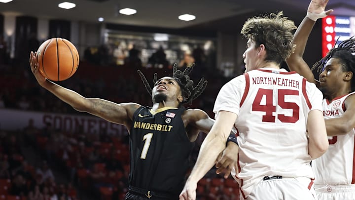 Vanderbilt Commodores guard Jason Edwards (1) shoots the ball against the Oklahoma Sooners during the first half at Lloyd Noble Center.