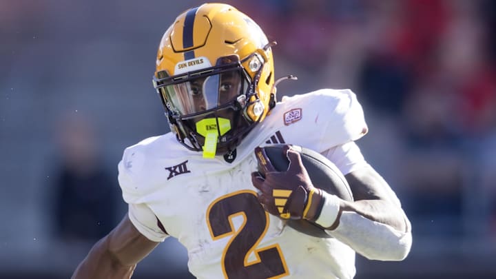 Nov 30, 2024; Tucson, Arizona, USA; Arizona State Sun Devils running back Kyson Brown (2) against the Arizona Wildcats during the Territorial Cup at Arizona Stadium. Mandatory Credit: Mark J. Rebilas-Imagn Images
