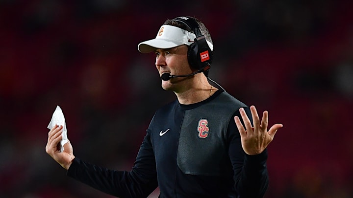 Sep 20, 2025; Los Angeles, California, USA; Southern California Trojans head coach Lincoln Riley watches game action against the Michigan State Spartans during the second half at the Los Angeles Memorial Coliseum. 