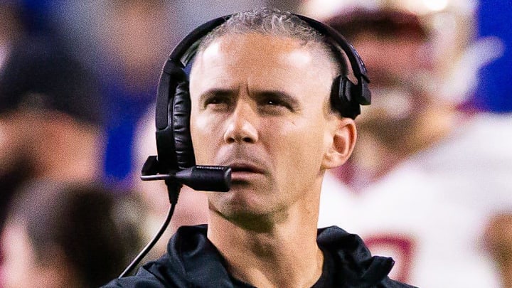 Florida State Seminoles head coach Mike Norvell looks to the replay screen at Steve Spurrier Field at Ben Hill Griffin Stadium in Gainesville, FL on Saturday, November 25, 2023 during the first half. [Doug Engle/Gainesville Sun]