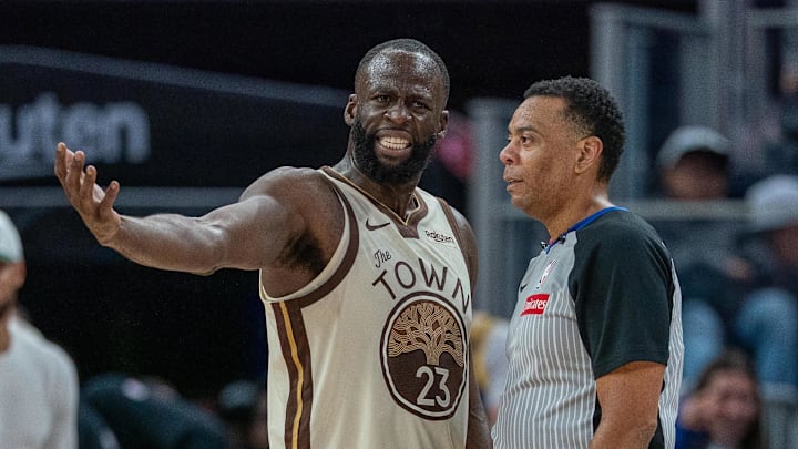Mar 27, 2026; San Francisco, California, USA; Golden State Warriors forward Draymond Green (23) talks with a referee after a foul against the Washington Wizards during the fourth quarterat Chase Center. Mandatory Credit: Neville E. Guard-Imagn Images