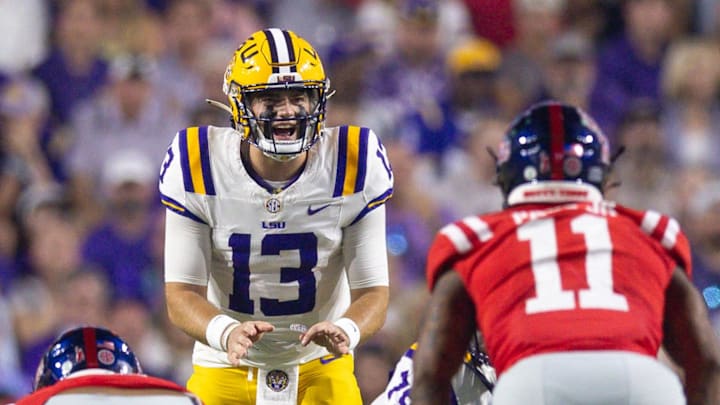 LSU Tigers quarterback Garrett Nussmeier (13) calls for the ball against the Ole Miss Rebels during the first half at Tiger Stadium. LSU Tigers quarterback Garrett Nussmeier (13) calls for the ball against the Ole Miss Rebels during the first half at Tiger Stadium.