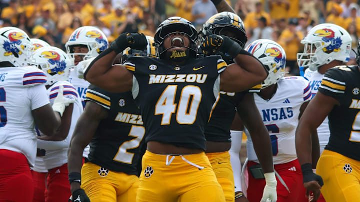Sep 6, 2025; Columbia, Missouri, USA; Missouri Tigers linebacker Josiah Trotter celebrates a tackle in the first quarter against Kansas.