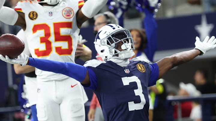 Dallas Cowboys wide receiver George Pickens celebrates after catching a pass for a successful two-point conversion.