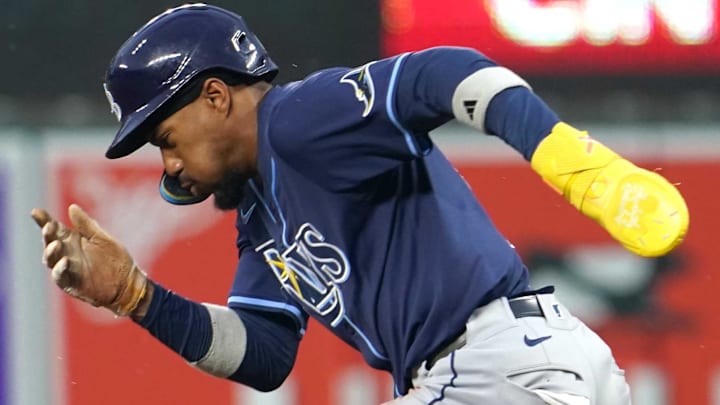 Sep 24, 2025; Baltimore, Maryland, USA; Tampa Bay Rays outfielder Chandler Simpson (14) steals a base during the first inning against the Baltimore Orioles at Oriole Park at Camden Yards.