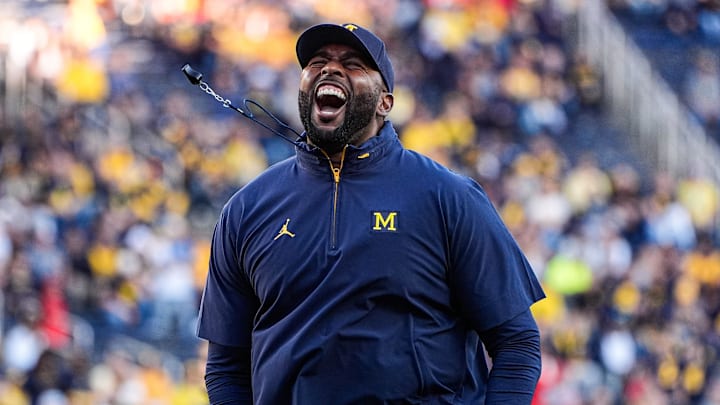 Michigan head coach Sherrone Moore fires up the student section during warm up ahead of the New Mexico game at Michigan Stadium in Ann Arbor on Saturday, August 30, 2025.