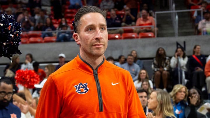 Auburn Tigers head coach Steven Pearl takes the court