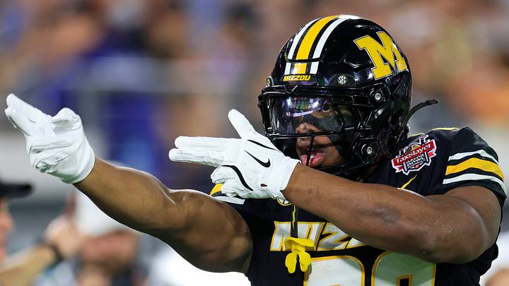 Missouri Tigers running back Ahmad Hardy (29) reacts to his first down pickup during the first quarter of the TaxSlayer Gator Bowl at EverBank Stadium, Saturday, Dec. 27, 2025, in Jacksonville. Fla. [Corey Perrine/Florida Times-Union]