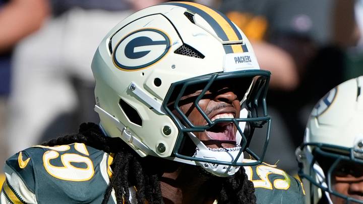Green Bay Packers linebacker Ty'Ron Hopper (59) celebrates getting an interception against the Chicago Bears. Green Bay Packers linebacker Ty'Ron Hopper (59) celebrates getting an interception against the Chicago Bears.