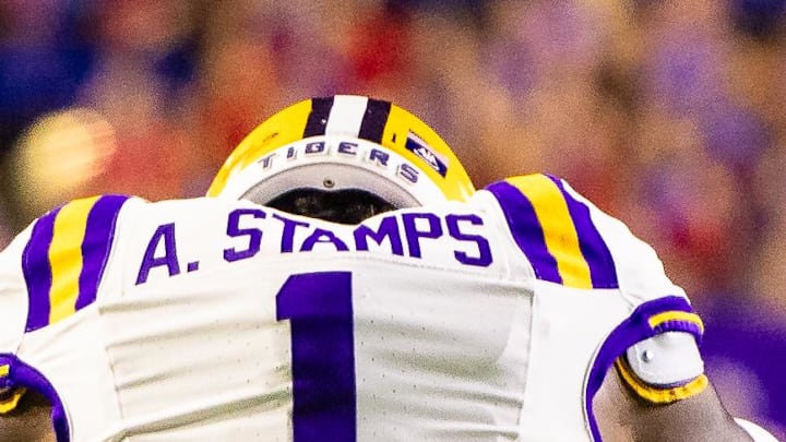 Sep 6, 2025; Baton Rouge, Louisiana, USA;  LSU Tigers cornerback Ashton Stamps (1) reacts to missing an interception against Louisiana Tech Bulldogs during the second half at Tiger Stadium. Mandatory Credit: Stephen Lew-Imagn Images