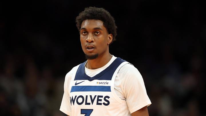 Nov 21, 2025; Phoenix, Arizona, USA; Minnesota Timberwolves forward Jaden McDaniels (3) against the Phoenix Suns during an NBA Cup game at Mortgage Matchup Center. Mandatory Credit: Mark J. Rebilas-Imagn Images