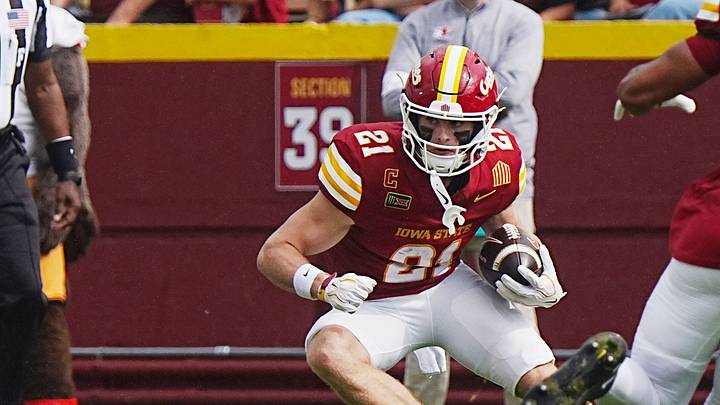 Iowa State punt returner Aiden Flora (21) breaks a tackle attempt by Bowling Green Falcons special team player Nick Sawyer (18) during a first-quarter punt return on Sept. 19, 2026, at Jack Trice Stadium in Ames, Iowa.