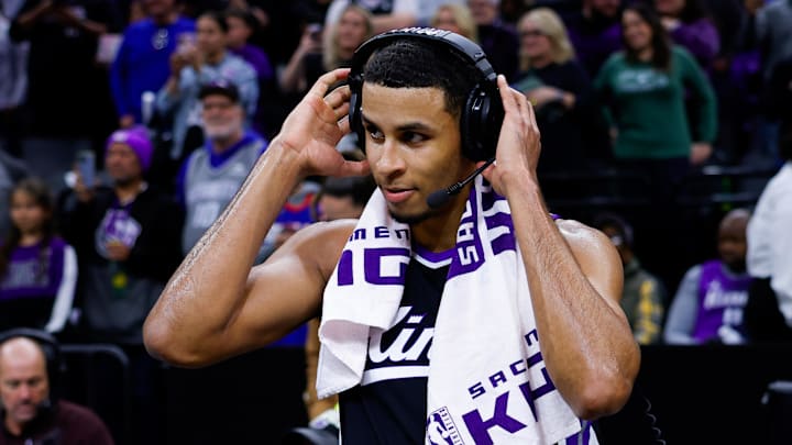 Mar 17, 2025; Sacramento, California, USA; Sacramento Kings forward Keegan Murray (13) is interviewed by media after the game against the Memphis Grizzlies at Golden 1 Center. Mandatory Credit: Sergio Estrada-Imagn Images