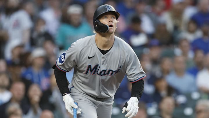 May 14, 2025; Chicago, Illinois, USA; Miami Marlins center fielder Kyle Stowers (28) watches his solo home run against the Chicago Cubs during the fourth inning at Wrigley Field. Mandatory Credit: Kamil Krzaczynski-Imagn Images