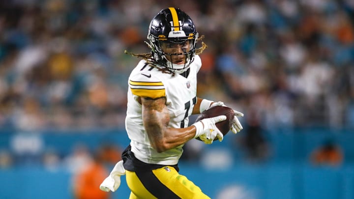 Oct 23, 2022; Miami Gardens, Florida, USA; Pittsburgh Steelers wide receiver Chase Claypool (11) runs with the football during the second quarter against the Miami Dolphins at Hard Rock Stadium. Mandatory Credit: Sam Navarro-Imagn Images