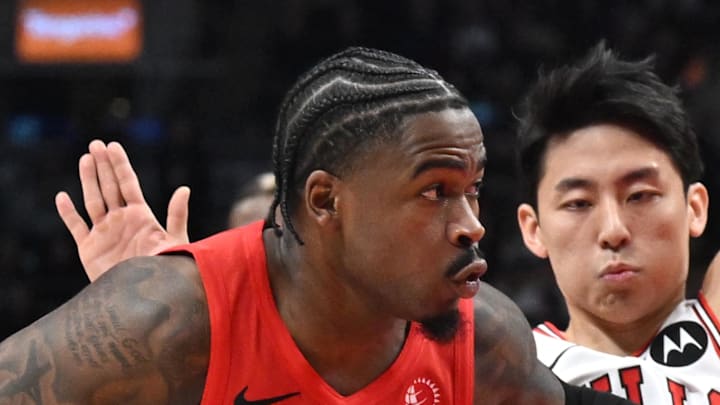Toronto Raptors guard Jamal Shead drives against Chicago Bulls guard Yuki Kawamura.