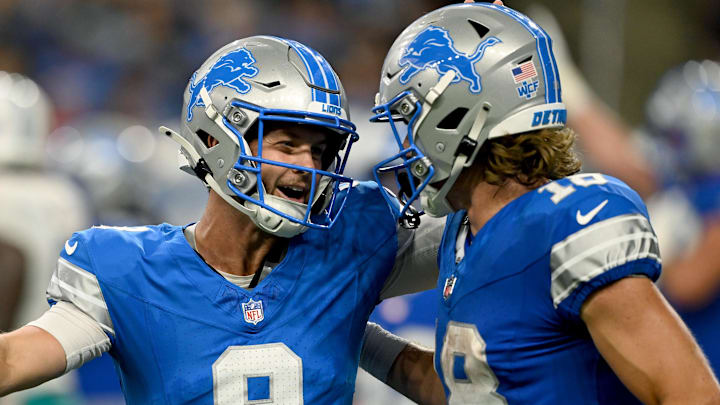 Detroit Lions quarterback Kyle Wilson (8) celebrates with wide receiver Isaac TeSlaa (18) after a touchdown toss Detroit Lions quarterback Kyle Wilson (8) celebrates with wide receiver Isaac TeSlaa (18) after a touchdown toss