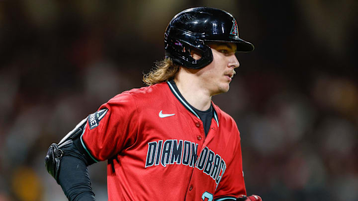 Sep 26, 2025; San Diego, California, USA; Arizona Diamondbacks left fielder Jake McCarthy (31) hits a one run home run during the third inning against the San Diego Padres at Petco Park. Mandatory Credit: David Frerker-Imagn Images