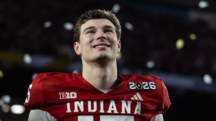 Jan 19, 2026; Miami Gardens, FL, USA; Indiana Hoosiers quarterback Fernando Mendoza (15) celebrates after defeating the Miami Hurricanes in the College Football Playoff National Championship game at Hard Rock Stadium. Mandatory Credit: Mark J. Rebilas-Imagn Images