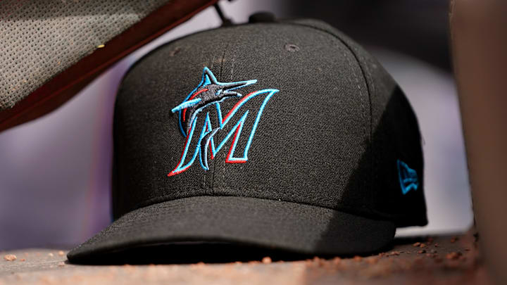 Apr 11, 2019; Cincinnati, OH, USA; A view of a New Era Miami Marlins hat in the dugout during the game against the Cincinnati Reds at Great American Ball Park. Mandatory Credit: Aaron Doster-Imagn Images