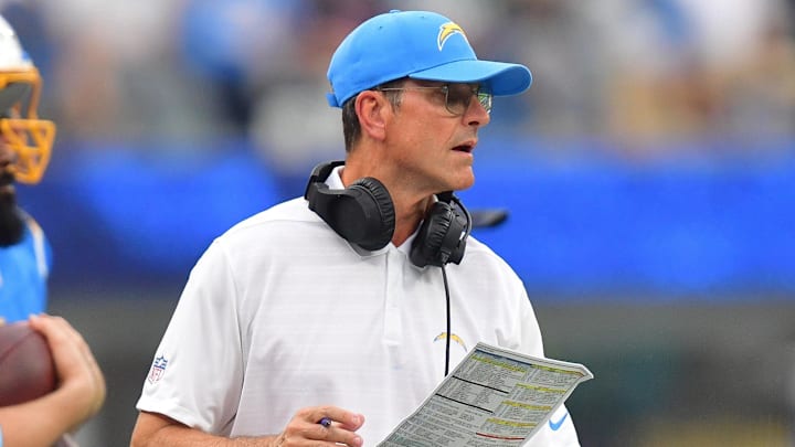 Oct 27, 2024; Inglewood, California, USA; Los Angeles Chargers head coach Jim Harbaugh watches game action against the New Orleans Saints during the second half at SoFi Stadium. Mandatory Credit: Gary A. Vasquez-Imagn Images