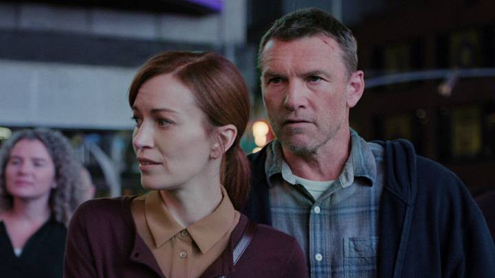 I Will Find You. (L to R) Britt Lower as Rachel Mills and Sam Worthington as David Burroughs in Episode #102 of I Will Find You. Cr. Courtesy of Netflix © 2025