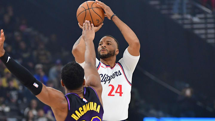 Jan 19, 2025; Inglewood, California, USA; Los Angeles Clippers guard Norman Powell (24) shoots against Los Angeles Lakers forward Rui Hachimura (28) during the first half at Intuit Dome. Mandatory Credit: Gary A. Vasquez-Imagn Images Jan 19, 2025; Inglewood, California, USA; Los Angeles Clippers guard Norman Powell (24) shoots against Los Angeles Lakers forward Rui Hachimura (28) during the first half at Intuit Dome. Mandatory Credit: Gary A. Vasquez-Imagn Images