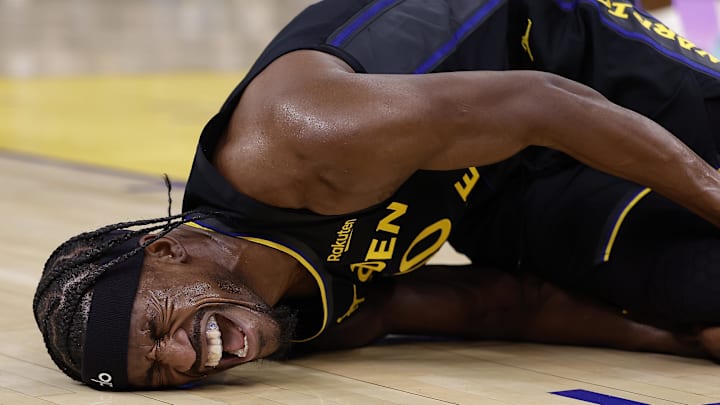 Jan 19, 2026; San Francisco, California, USA; Golden State Warriors forward Jimmy Butler III (10)he goes down with a knee injury during the third quarter against the Miami Heat at Chase Center. Mandatory Credit: Kelley L Cox-Imagn Images