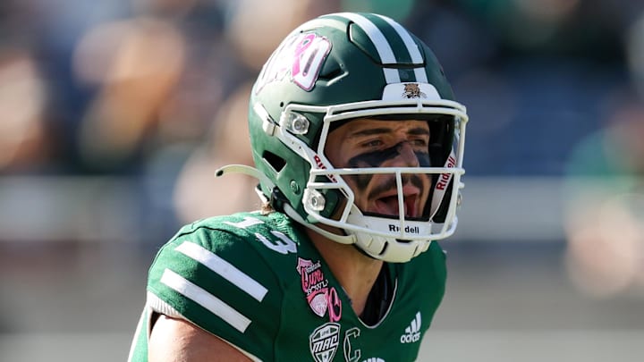 Dec 20, 2024; Orlando, FL, USA; Ohio Bobcats quarterback Parker Navarro (13) calls a play at the line against the Jacksonville State Gamecocks in the third quarter at Camping World Stadium. Mandatory Credit: Nathan Ray Seebeck-Imagn Images