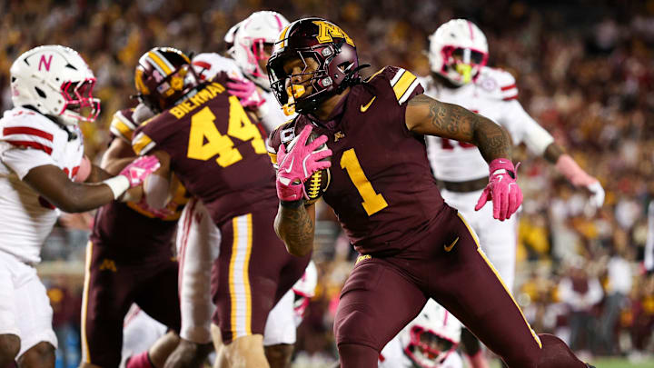 Minnesota's Darius Taylor runs for a touchdown during the second half against Nebraska. 