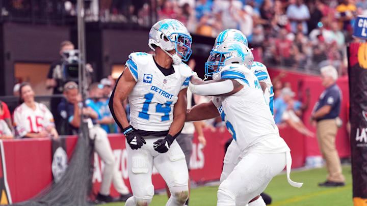 Detroit Lions wide receiver Amon-Ra St. Brown (14) celebrates a touchdown against the Arizona Cardinals