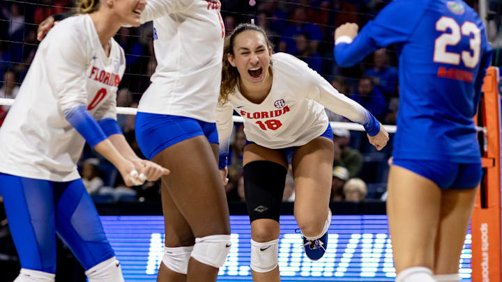 Penn State women's volleyball right side hitter Kennedy Martin with former team, Florida Gators
